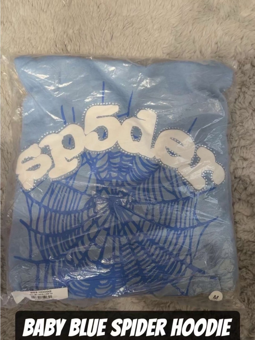 Baby Blue Hoodie with Bold Spider Web Graphic